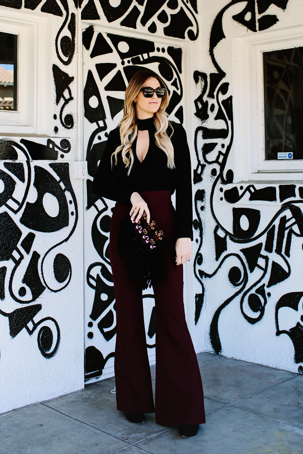 caitlin lindquist street style fashion blogger high waisted maroon flared pants
