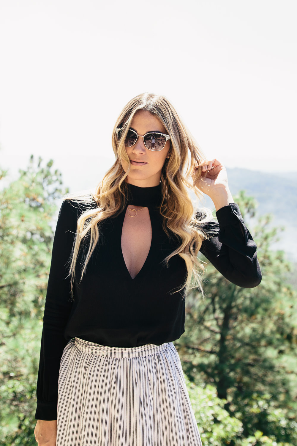 Dash of Darling styles a keyhole neckline top with a maxi skirt and DVF sunglasses while exploring Payson Arizona in the Fall.