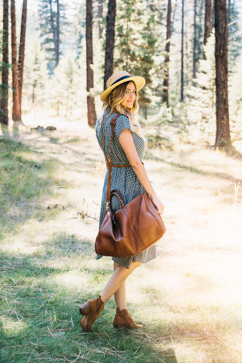Dash of Darling styles a J.Crew gingham dress with a Sole Society duffle bag, cross body tote and booties for a Fall outfit while traveling to Missoula Montana. 