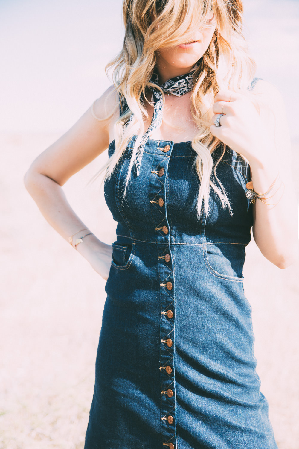 Dash of Darling styles a denim button down Madewell dress for an easy summer outfit.