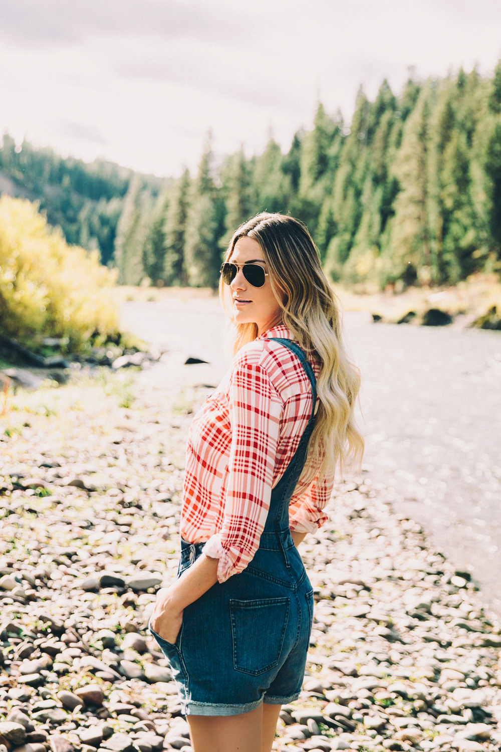 Dash of Darling styles three Fall trends with Stein Mart, from plaid to olive green to high-low hems while traveling in Montana.