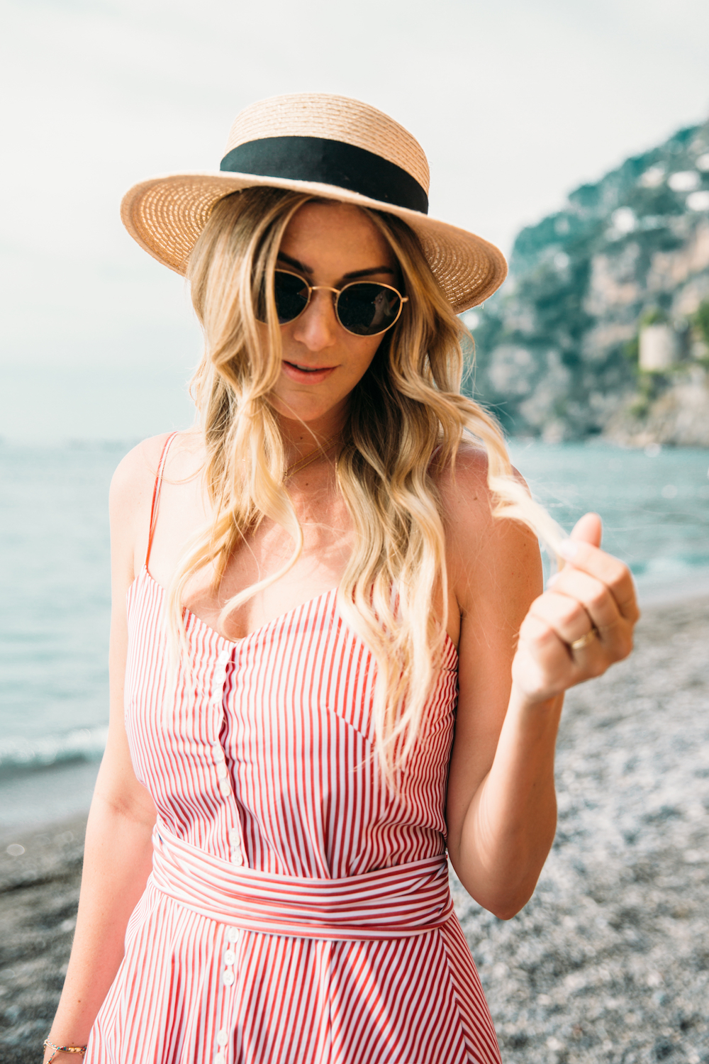 Caitlin Lindquist of Dash of Darling shares her travel diary from Positano, Italy with Royal Caribbean Cruises while wearing a stripe Elle Sasson dress.