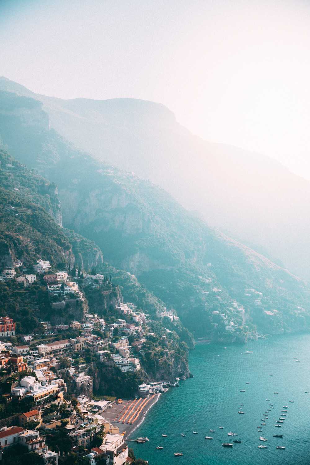 Caitlin Lindquist of Dash of Darling shares her travel diary from Positano, Italy with Royal Caribbean Cruises while wearing a stripe Elle Sasson dress.