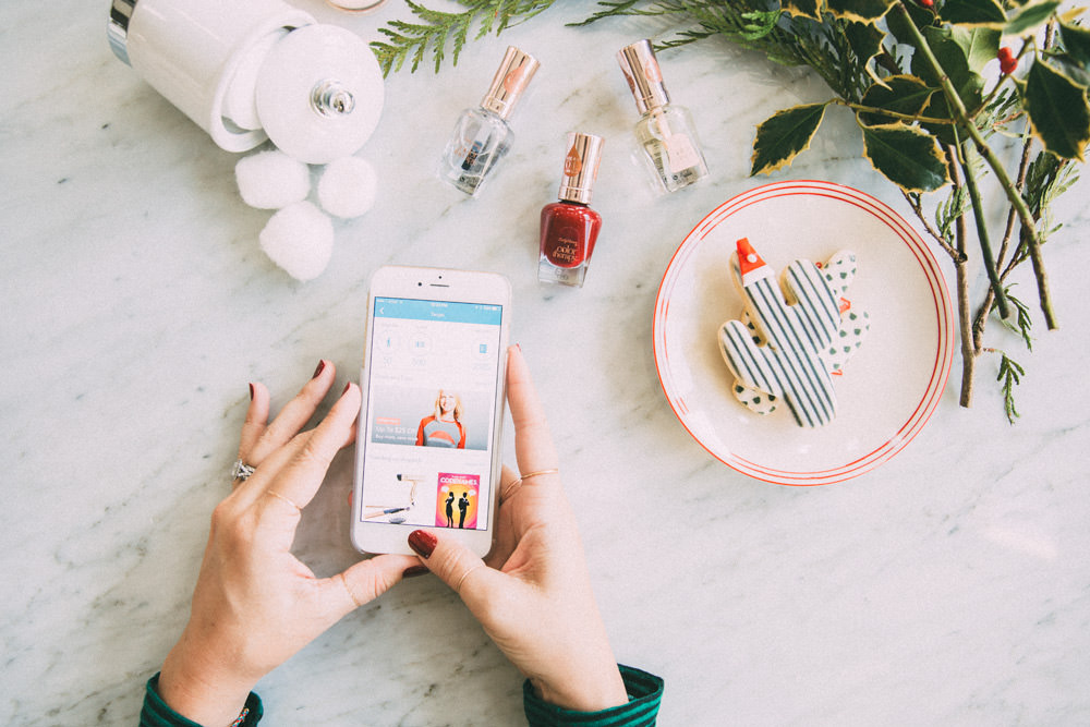 Caitlin Lindquist of blog Dash of Darling paints her nails with Sally Hansen Color Therapy polish using Shopkick Rewards at Target.