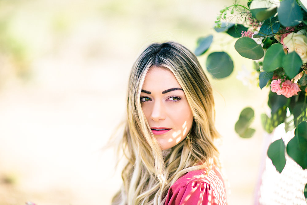 Caitlin Lindquist of Dash of Darling shares a Valentine's Day styled shoot in Scottsdale, Arizona wearing a silk Privacy Please wrap dress and Vanessa Mooney lace choker.