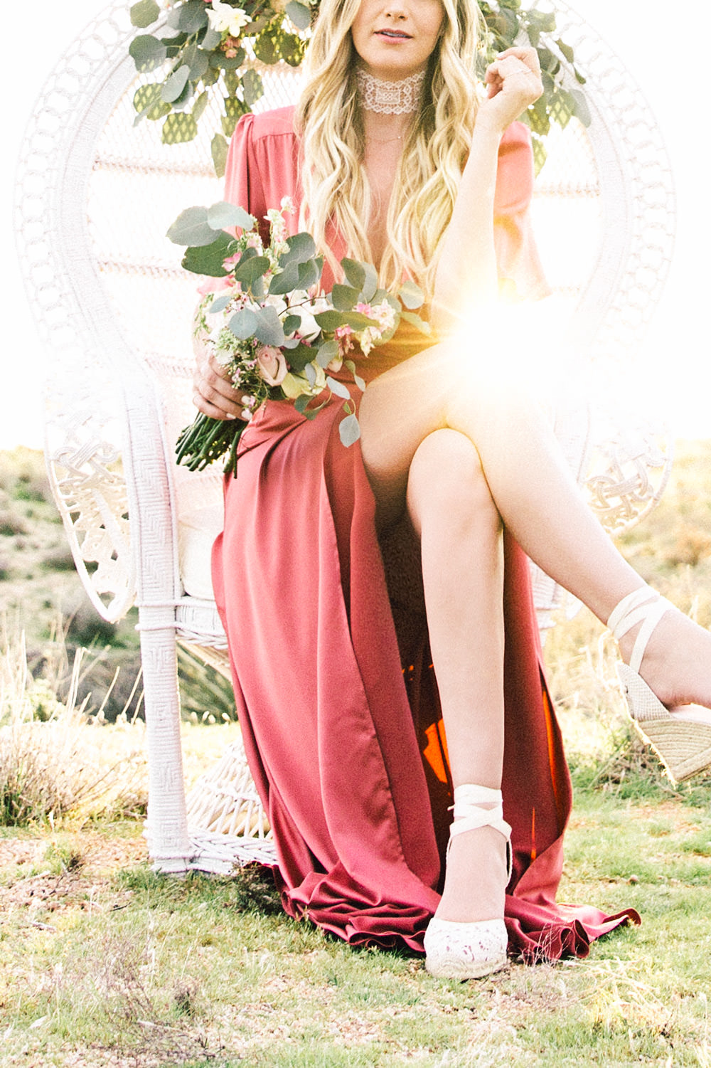 Caitlin Lindquist of Dash of Darling shares a Valentine's Day styled shoot in Scottsdale, Arizona wearing a silk Privacy Please wrap dress and Vanessa Mooney lace choker.