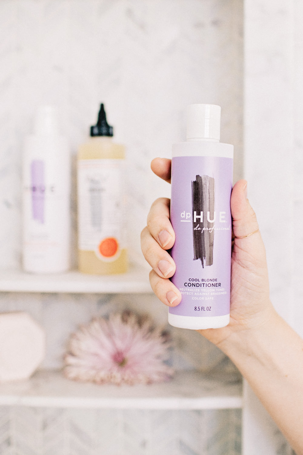 Dash of Darling shares how to keep your hair cool blonde with dphue blonding shampoo and conditioner