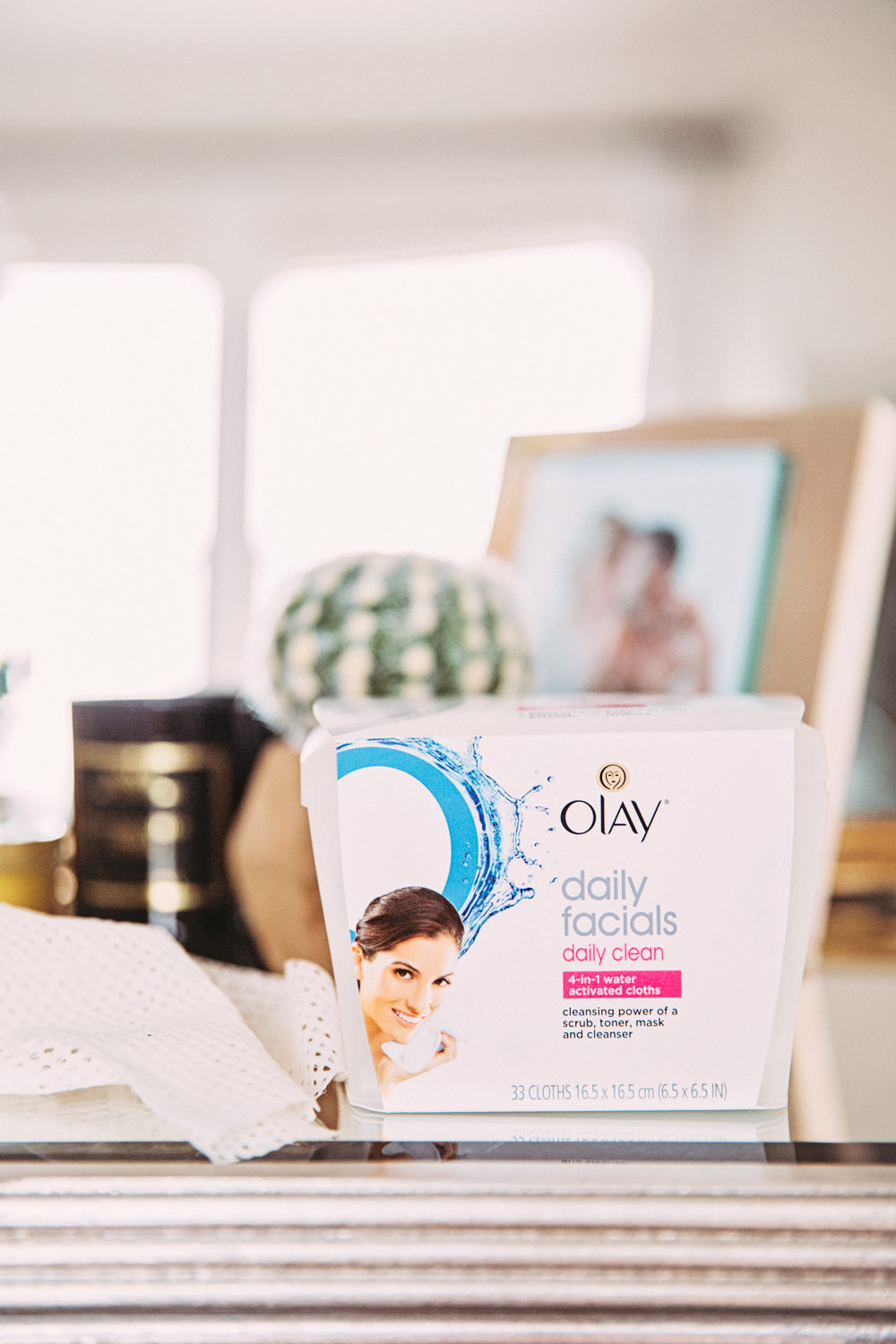 Dash of Darling shares four nighttime essentials that she keeps by her bedside on her nightstand, including Olay Daily Facials cleansing cloths.