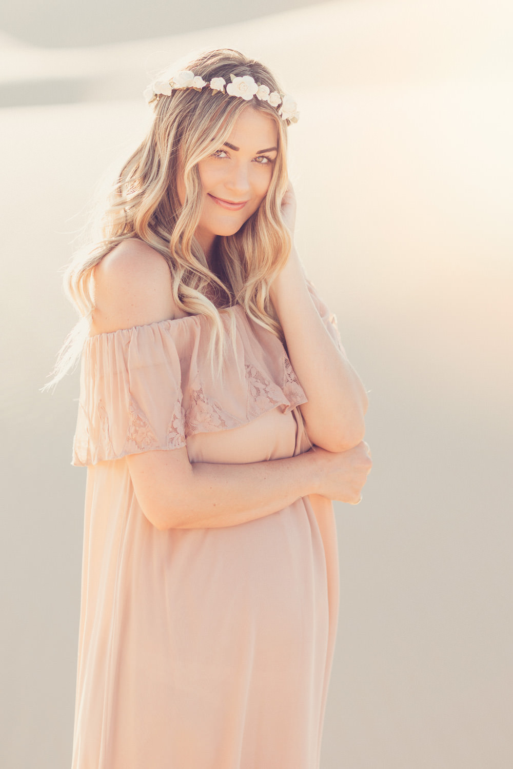Caitlin Lindquist of the fashion blog Dash of Darling shares her pregnancy announcement after years of infertility, three rounds of IVF and two miscarriages.