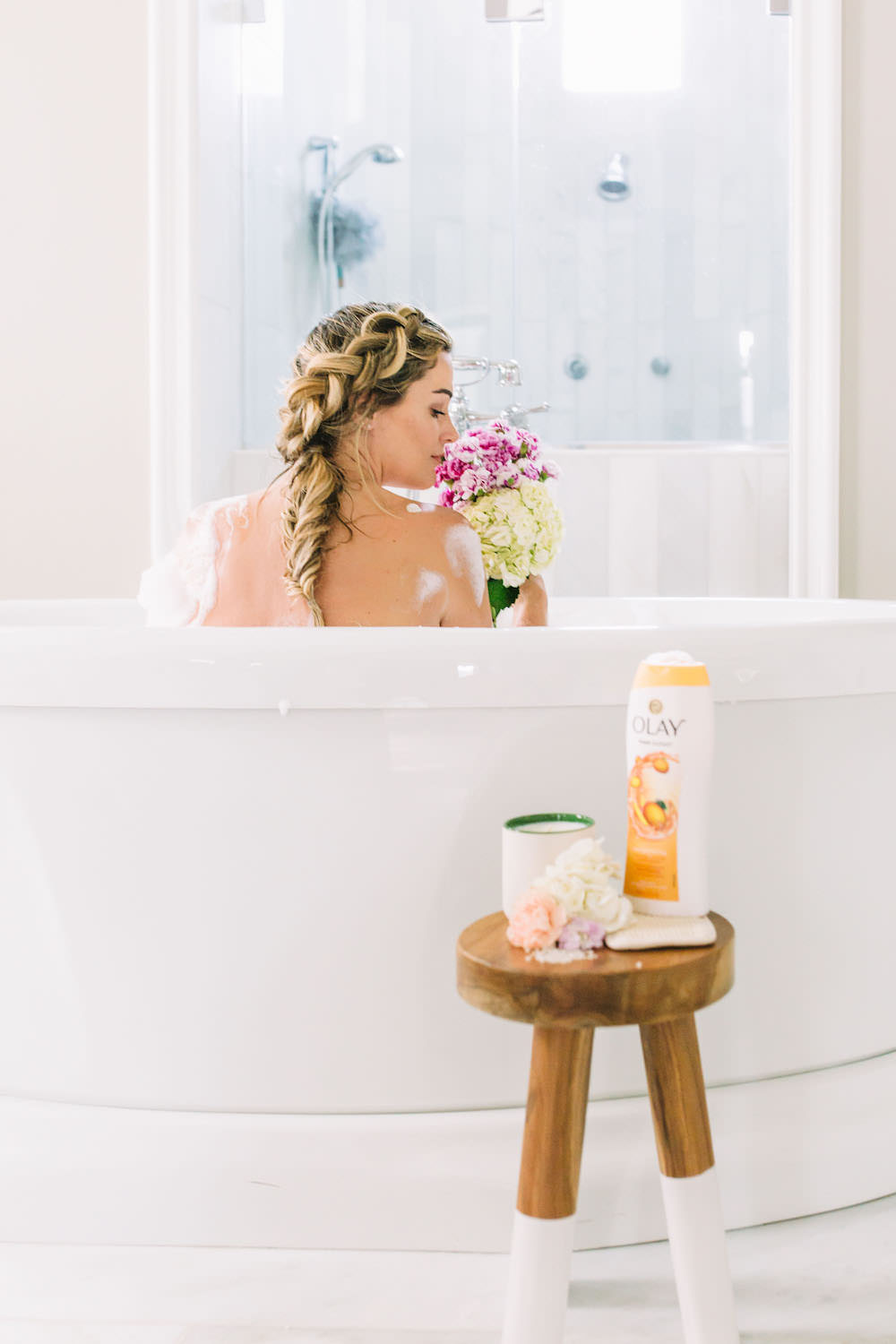 Caitlin Lindquist of the Arizona beauty blog Dash of Darling shares three steps to smooth summer skin while taking a relaxing bath with petals.